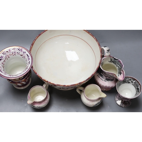 343 - A group of early 19th century pink lustre vases and jugs and a junket bowl