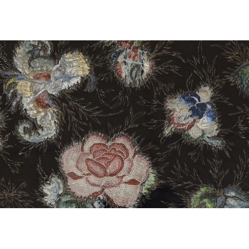 356 - Framed floral silk embroidery, the mount dated 1867