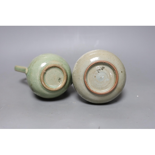 362 - A Korean celadon wine pot and a similar vase, tallest 22cm