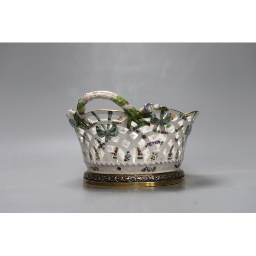 366 - A two handled German silver mounted circular floral Berlin porcelain basket. 10cm high