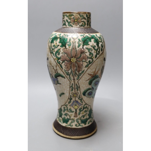 377 - A Chinese crackle glaze famille verte vase. 29cm high