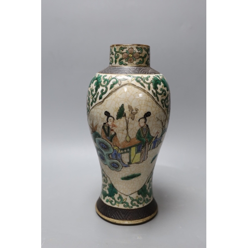 377 - A Chinese crackle glaze famille verte vase. 29cm high