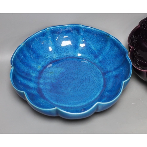 386 - A Chinese blue crackle-glaze fluted bowl, together with another similar in purple. 28cm diameter... 