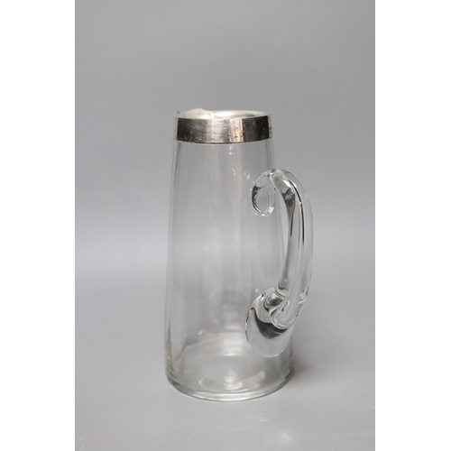 388 - An early 20th century Asprey silver mounted glass jug. 24.5cm tall