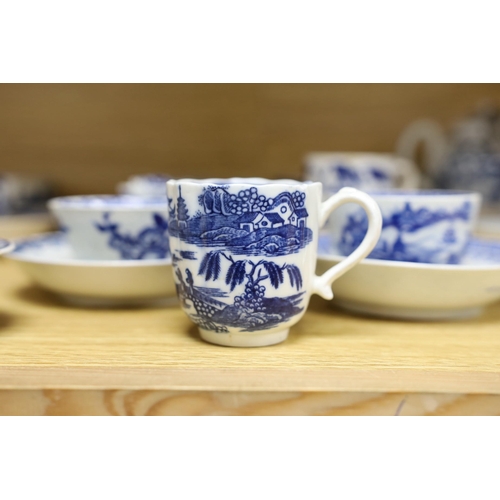 403 - A large group of 18th century Worcester, Caughley and Liverpool blue and white tea bowls, coffee cup... 