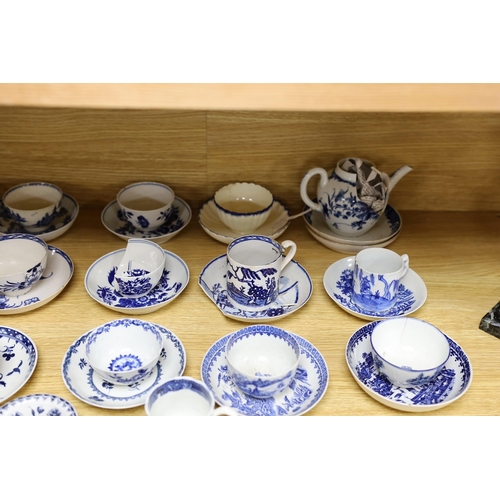 403 - A large group of 18th century Worcester, Caughley and Liverpool blue and white tea bowls, coffee cup... 