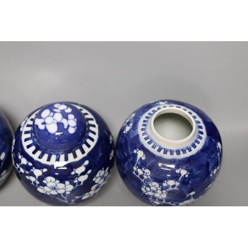 411 - Four 19th / early 20th century Chinese blue and white prunus jars, 14cm