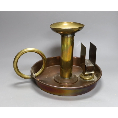 419 - A large brass and copper chamberstick by G Farris, London, 20cm