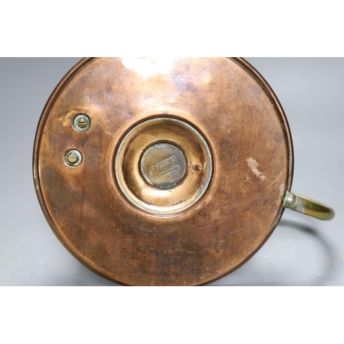 419 - A large brass and copper chamberstick by G Farris, London, 20cm