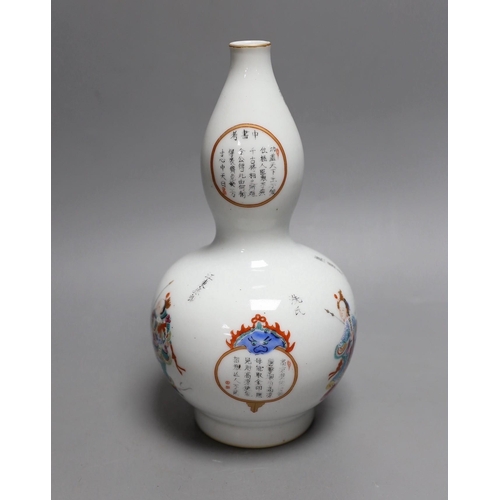 433 - A Chinese famille rose double gourd vase, 24cm