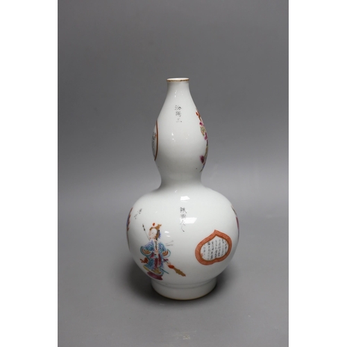 433 - A Chinese famille rose double gourd vase, 24cm