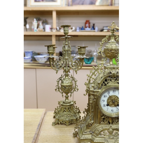 457 - A French brass clock garniture c.1900, Japy Freres movement. 48cm high