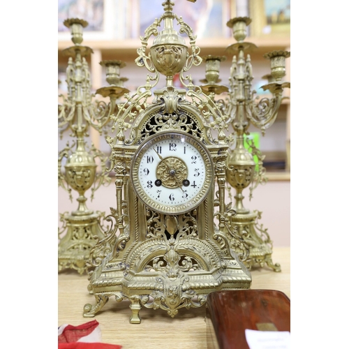 457 - A French brass clock garniture c.1900, Japy Freres movement. 48cm high