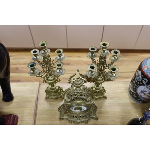 457 - A French brass clock garniture c.1900, Japy Freres movement. 48cm high