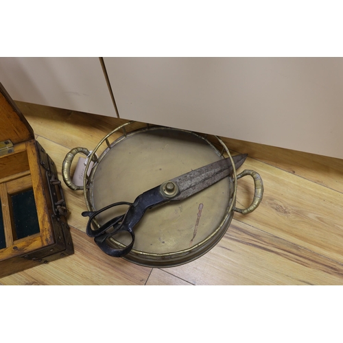 473 - An oak and metal bound box, a circular brass tray and a pair of draper's scissors