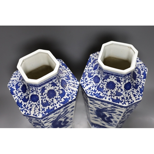 494 - A pair of large Chinese blue and white dragon vases, 40cm