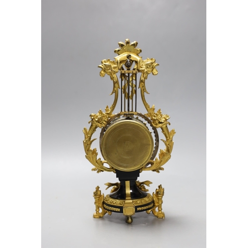 505 - An early 20th century French ormolu mounted miniature lyre clock, 24 cm time