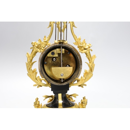 505 - An early 20th century French ormolu mounted miniature lyre clock, 24 cm time