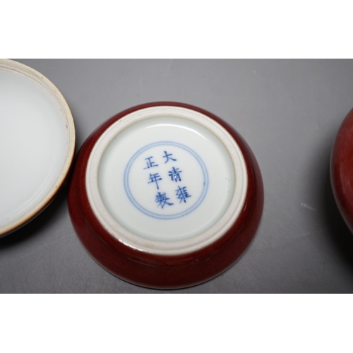 527 - A Chinese sang de boeuf glazed seal paste box and a small pot (2) box 7.5cm diameter