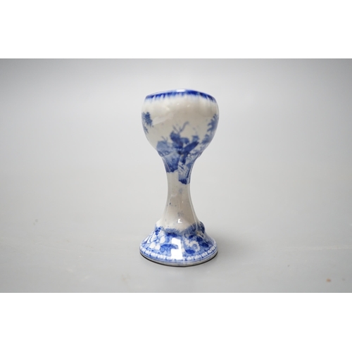 532 - A Spode blue and white transfer printed pottery eye bath, early 19th century decorated with a landsc... 