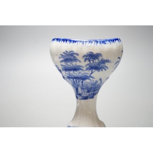 532 - A Spode blue and white transfer printed pottery eye bath, early 19th century decorated with a landsc... 