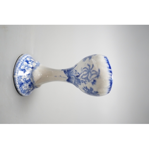 532 - A Spode blue and white transfer printed pottery eye bath, early 19th century decorated with a landsc... 