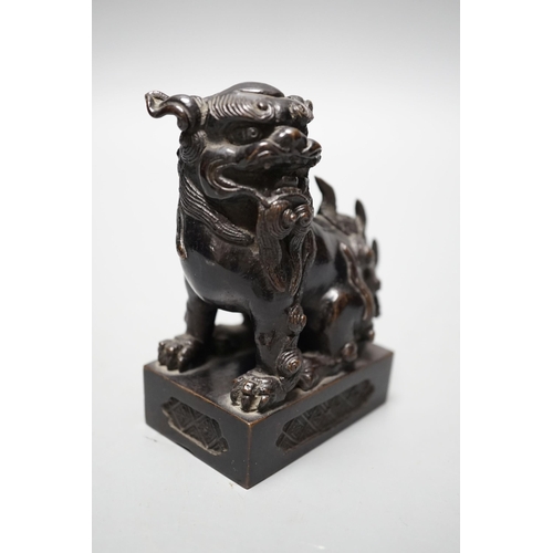 533 - A Japanese bronze Buddhistic lion, Nogara, Noburu mark to base, 11cm