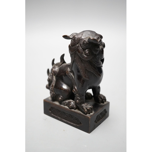 533 - A Japanese bronze Buddhistic lion, Nogara, Noburu mark to base, 11cm