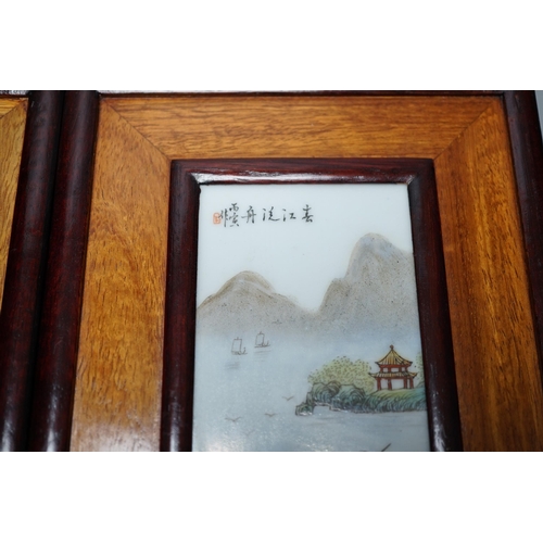 561 - A pair of Chinese framed porcelain plaques 25x15cm including frame