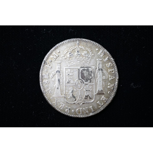 579 - A contemporary copy? - a George III silver dollar, head of George III countermark on a replica of a ... 