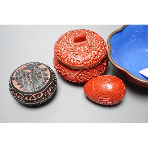 597 - A Chinese cinnabar lacquer bowl, a similar covered box and egg, and a carved circular box and cover... 