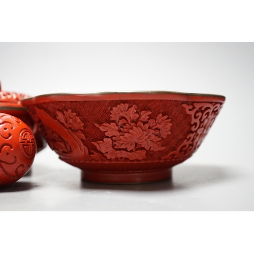 597 - A Chinese cinnabar lacquer bowl, a similar covered box and egg, and a carved circular box and cover... 