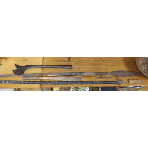 623 - Tribal weaponry - two spears, two clubs and an arrow, longest 236cm