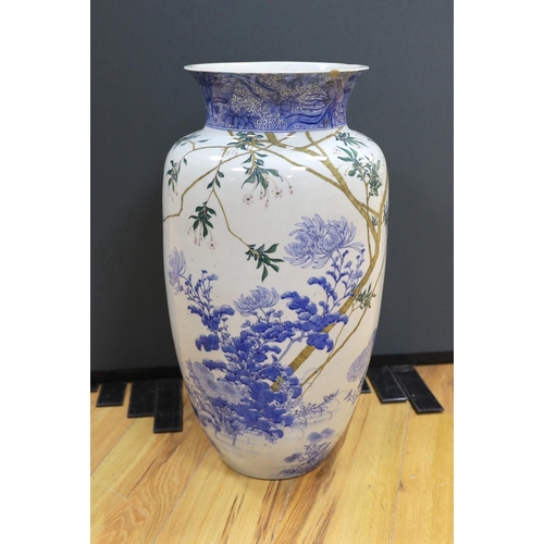 635 - A massive Japanese underglaze blue and enamelled vase, Meiji period, 62cm