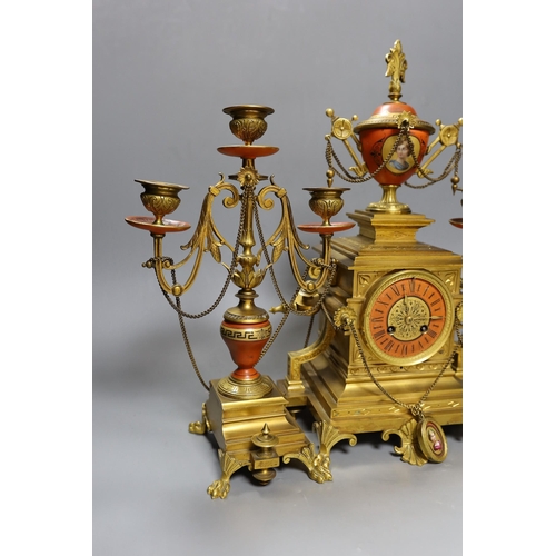 637 - A late 19th century French Etruscan revival ormolu and porcelain mounted three piece clock garniture... 