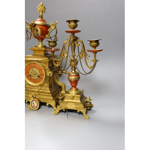 637 - A late 19th century French Etruscan revival ormolu and porcelain mounted three piece clock garniture... 