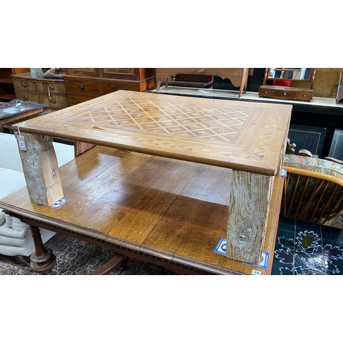 71 - A rectangular parquetry coffee table, width 115cm, depth 89cm, height 40cm