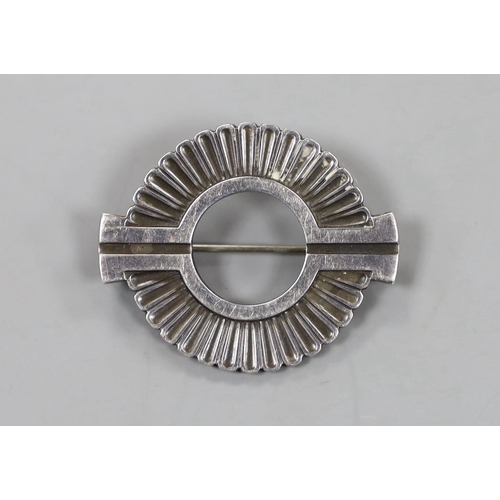 919 - A Georg Jensen sterling 925 studio art brooch, of openwork circular form, design no. 310, 33mm.... 