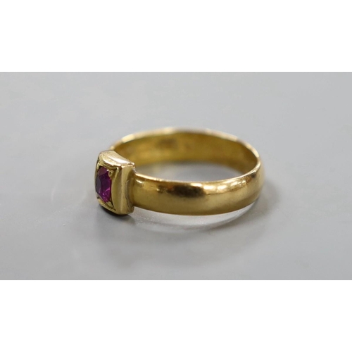 920 - A Victorian 22ct gold and single stone gypsy set ruby ring, size M, gross weight 3.9 grams.