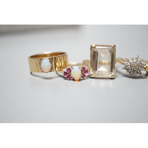 927 - Seven assorted modern 9ct gold and gem set dress rings, including diamond cluster, white opal and wh... 