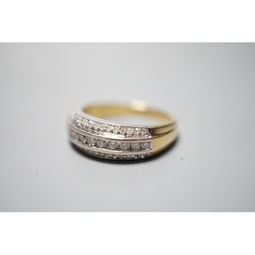 932 - A modern 18ct gold and three row diamond set half eternity ring, size P, gross weight 6.8 grams.... 