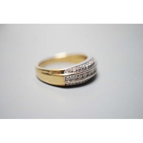 932 - A modern 18ct gold and three row diamond set half eternity ring, size P, gross weight 6.8 grams.... 