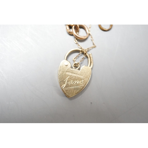 938 - A 9ct gold curblink bracelet, with heart shaped padlock clasp, approx. 19cm, 20 grams.