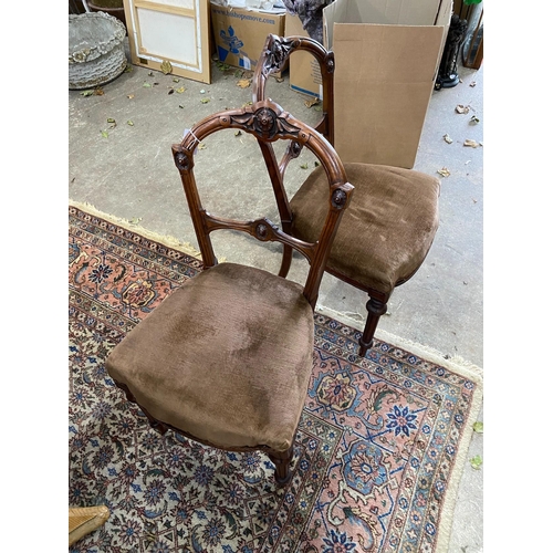 94 - A set of four Victorian walnut dining chairs