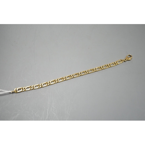 943 - A modern 750 yellow metal rectangular link bracelet, 18cm, 18 grams.