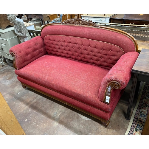 1010 - A 19th century French mahogany show-frame settee, width 1832cm