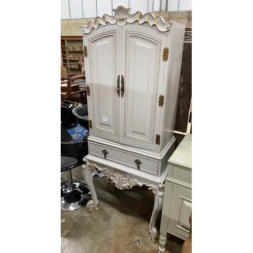 1014 - A French grey painted hardwood cocktail cabinet, with parcel gilt decoration, width 75cm height 175c... 