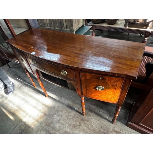 1020 - A Regency mahogany bowfronted sideboard, length 153cm, depth 58cm, height 92cm