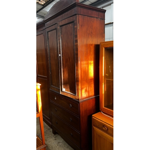 1022 - An early 20th century Regency style narrow mahogany linen press, width 92cm, depth 54cm, height 220c... 