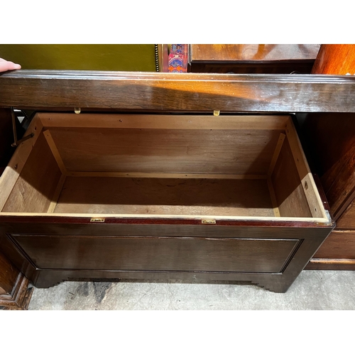 1034 - A 20th century camphor wood trunk, length 101cm, depth 50cm, height 59cm